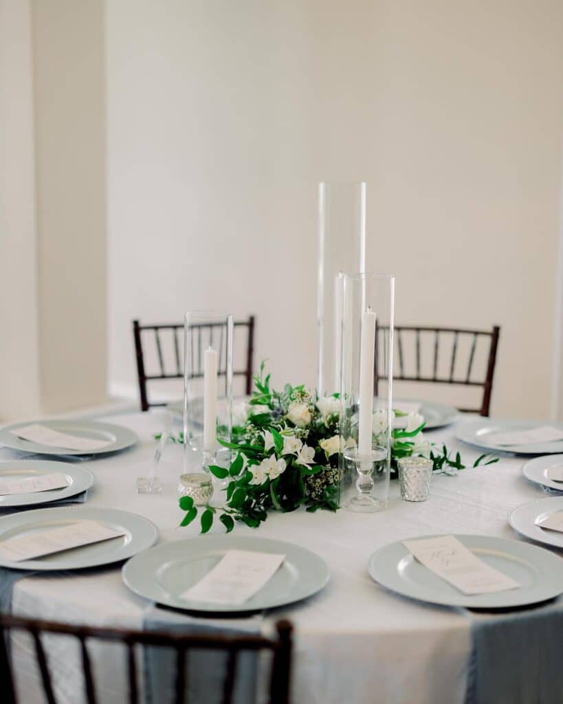 all-white wedding reception place setting