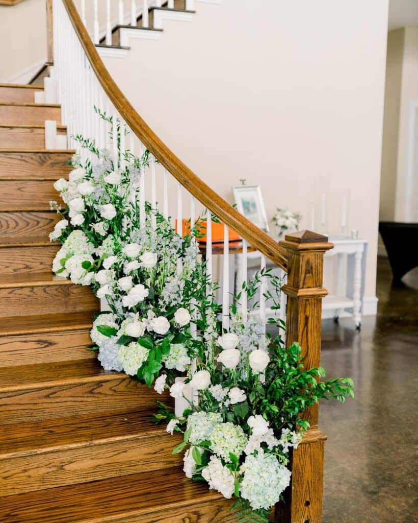 stairwell with white flowers 